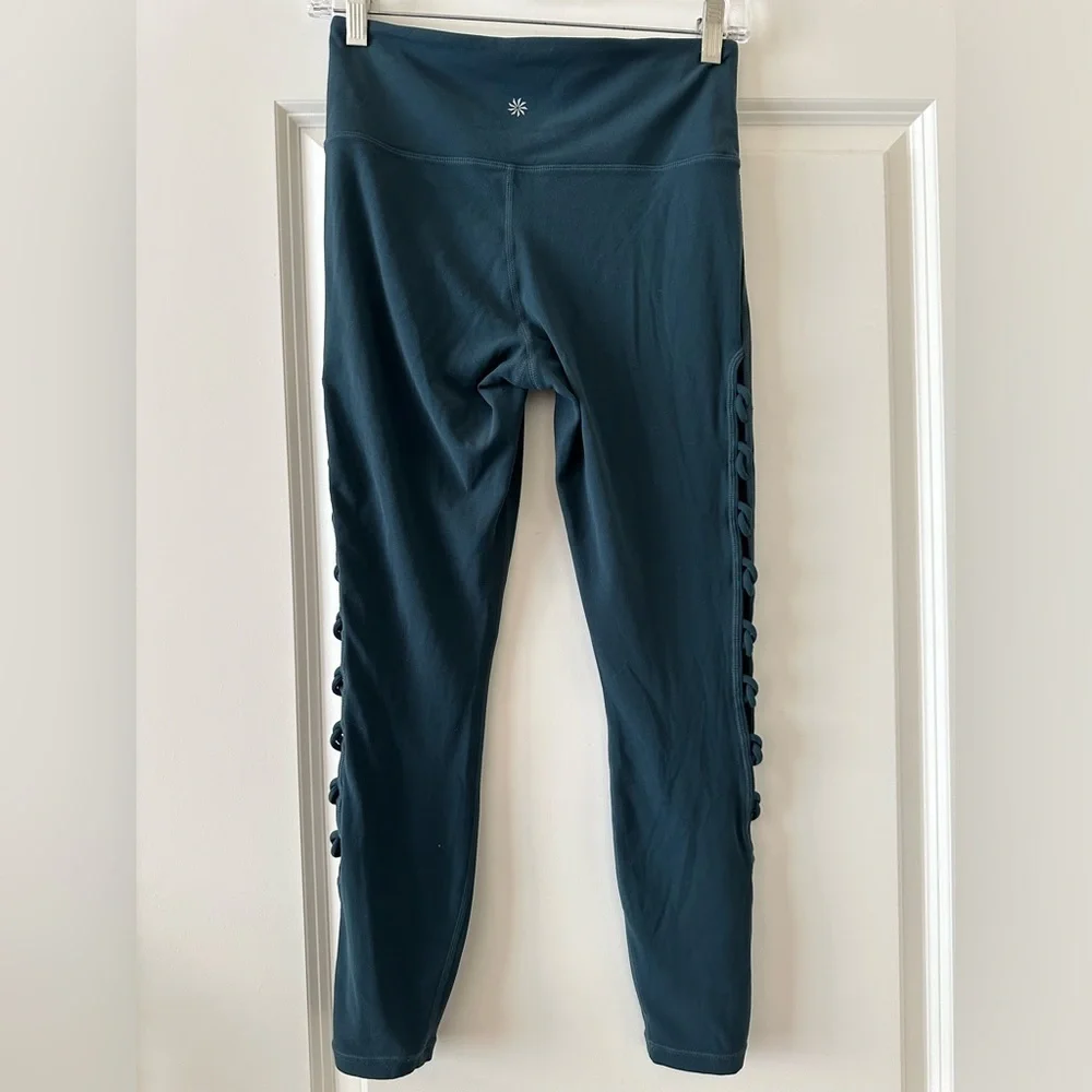 TEAL Color: Athleta Shiva 7/8 Leggings. Cut out sides. Size Small. EUC